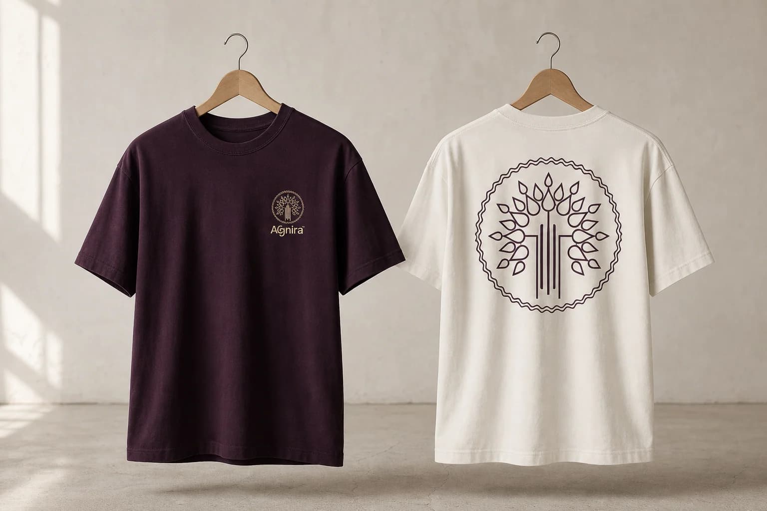 Agnira identity printed on aubergine and bone cotton T-shirts
