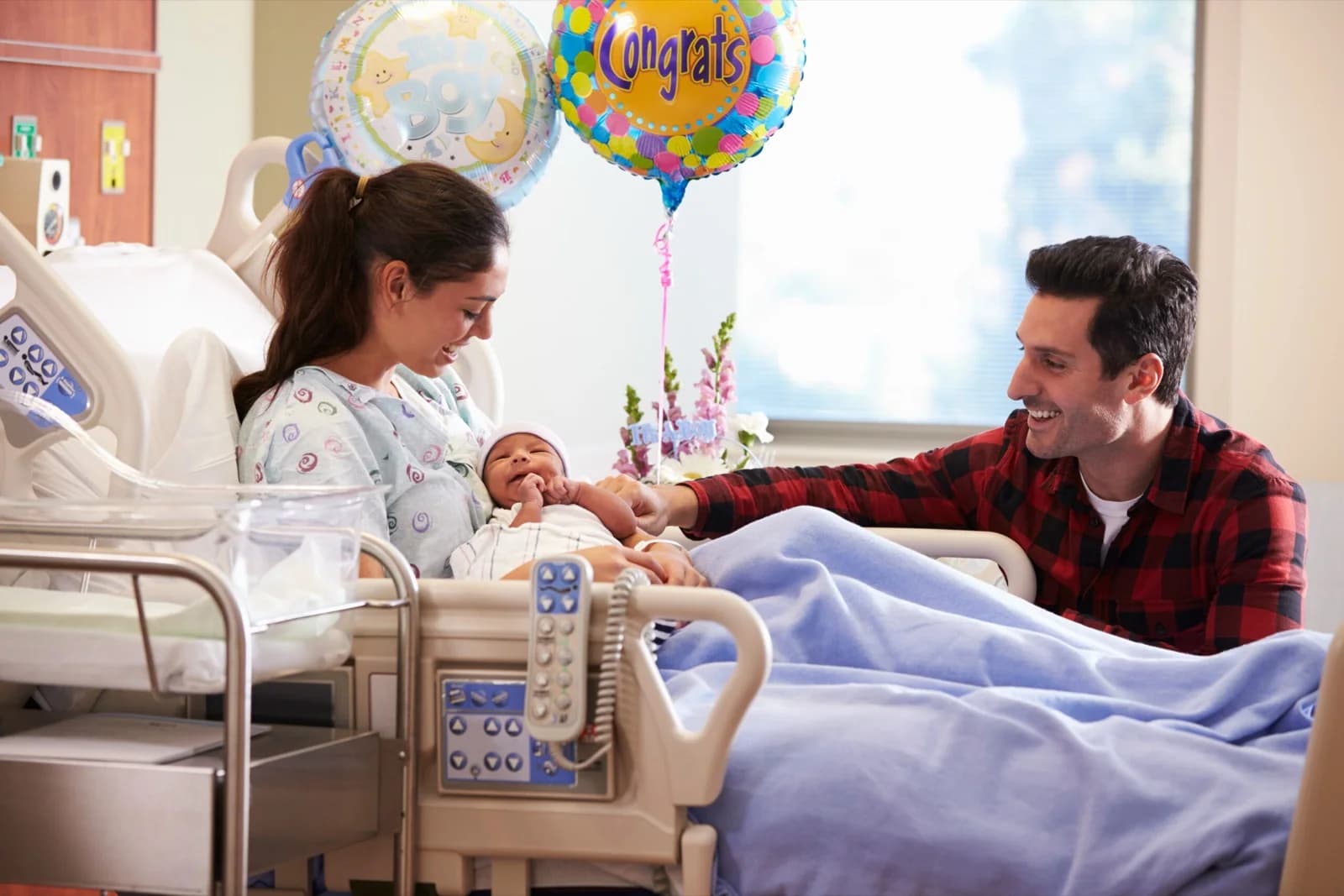 Family welcoming a newborn with healthcare support on the Atrix website