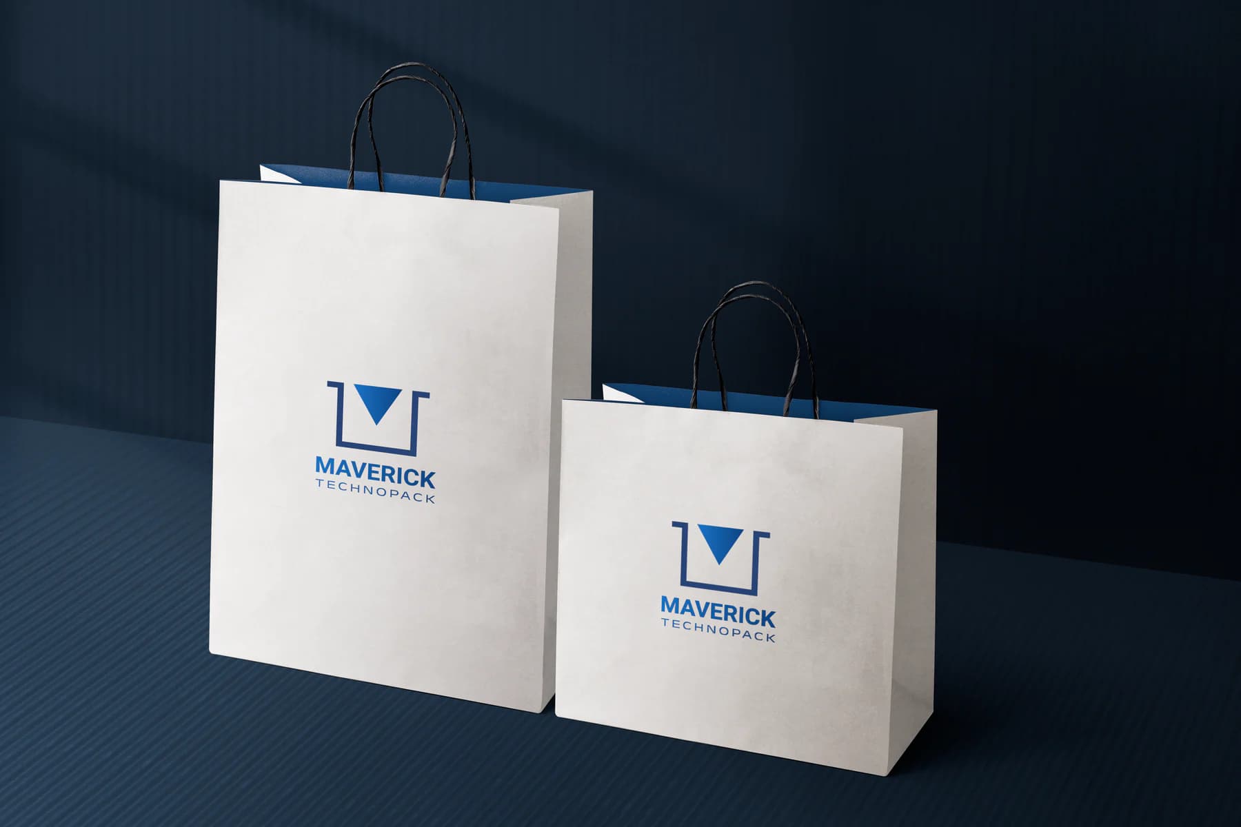 Maverick Technopack geometric identity on blue and white shopping bags