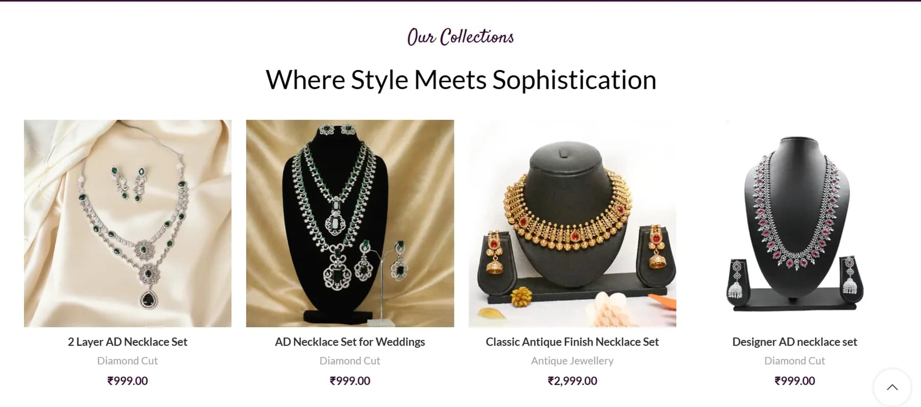 Dhanvi Abharan website homepage design shown in a desktop browser